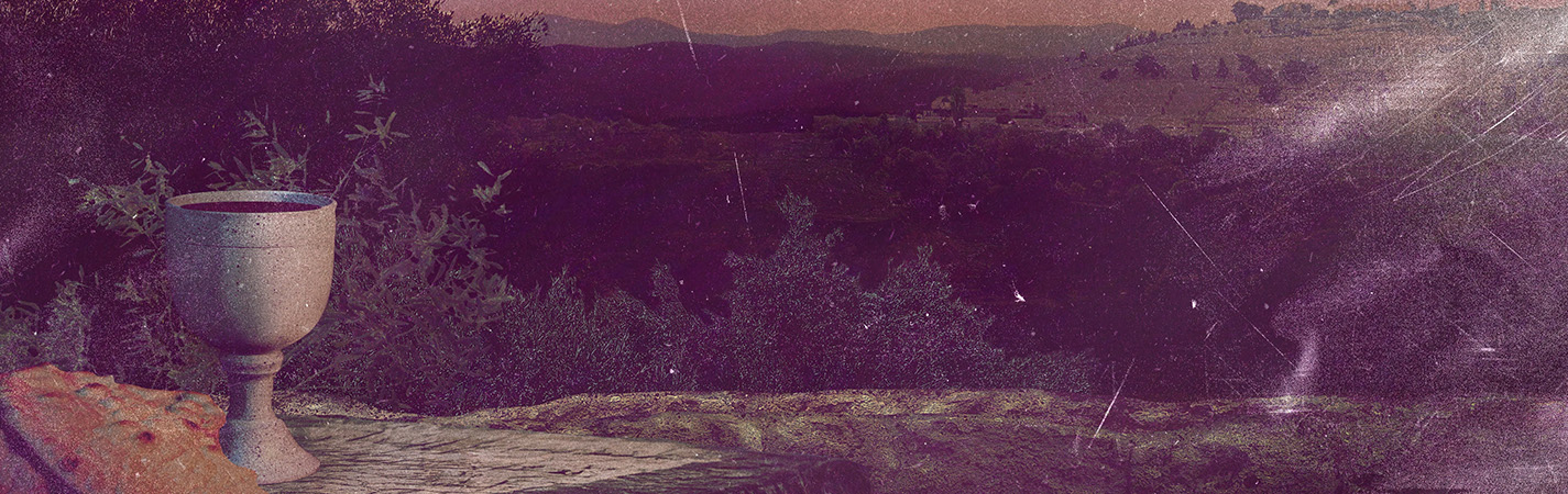 A landscape with trees and mountains in the background
