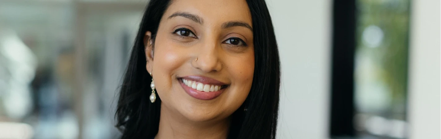 A woman smiling at the camera