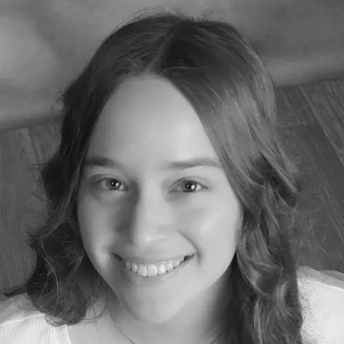 A woman smiling at the camera
