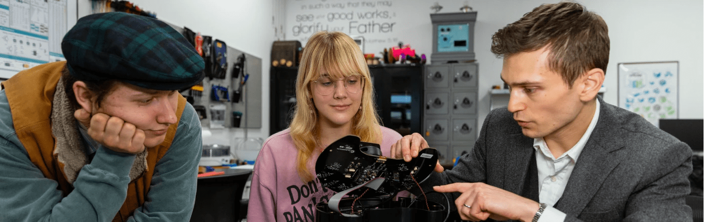 A woman looking at a device