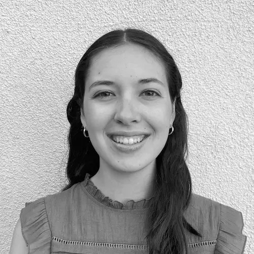 A woman smiling at camera