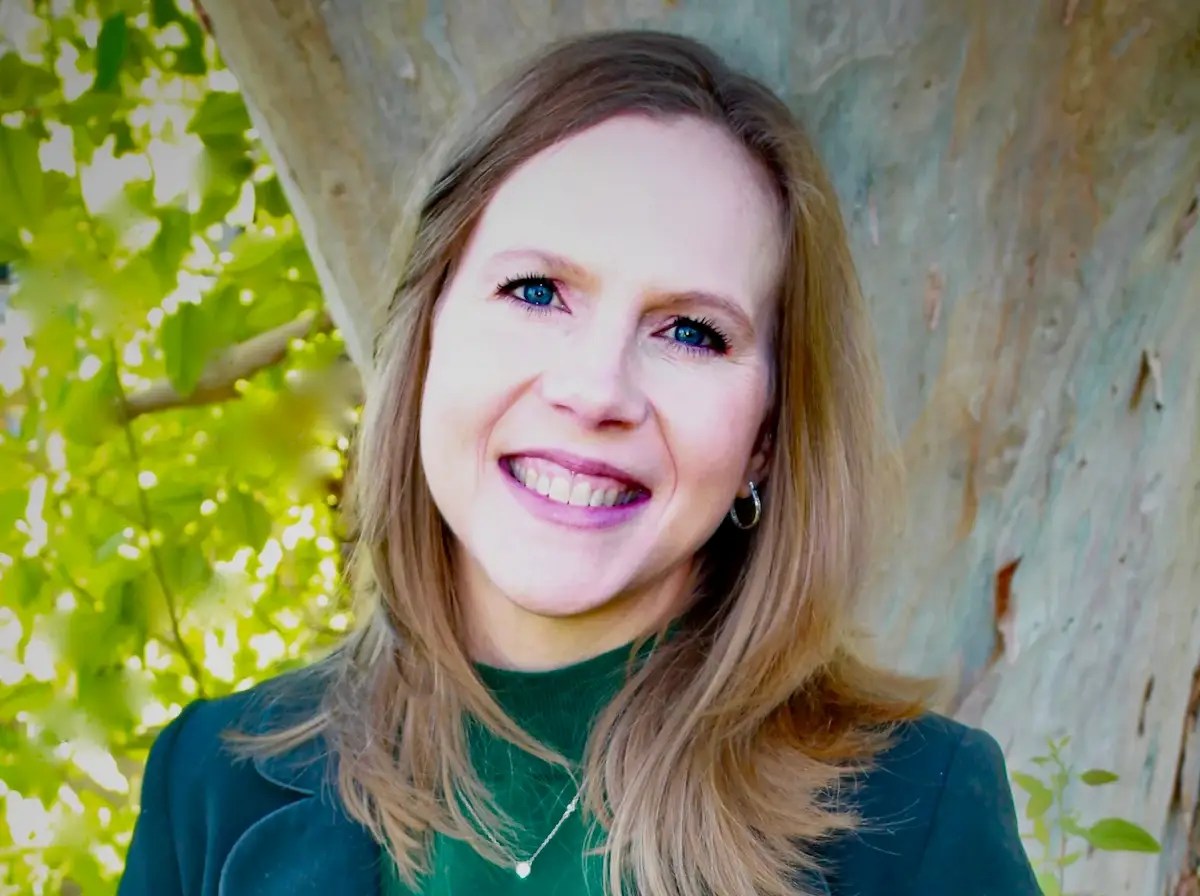 A woman smiling at camera