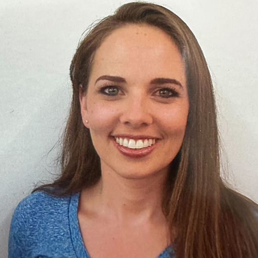 A woman smiling at the camera