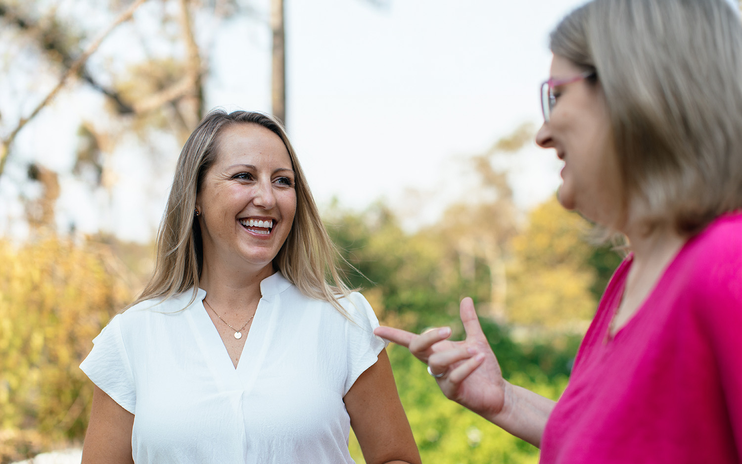A woman talking to another woman