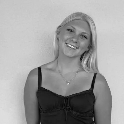 A woman smiling at the camera
