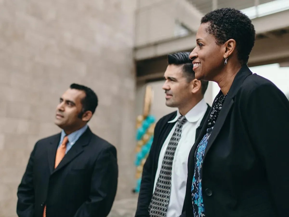 A group of people in suits