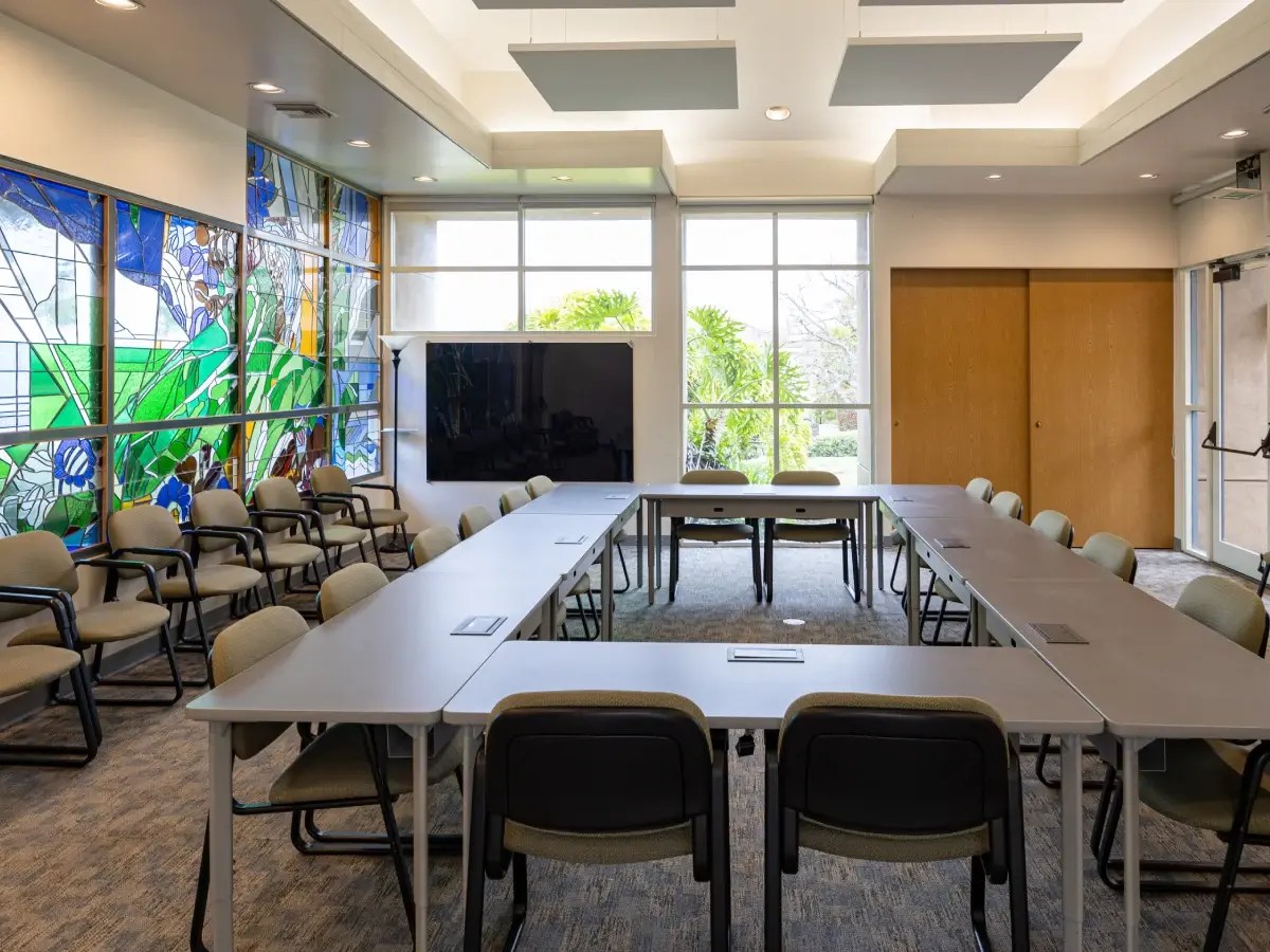 A room with a table and chairs