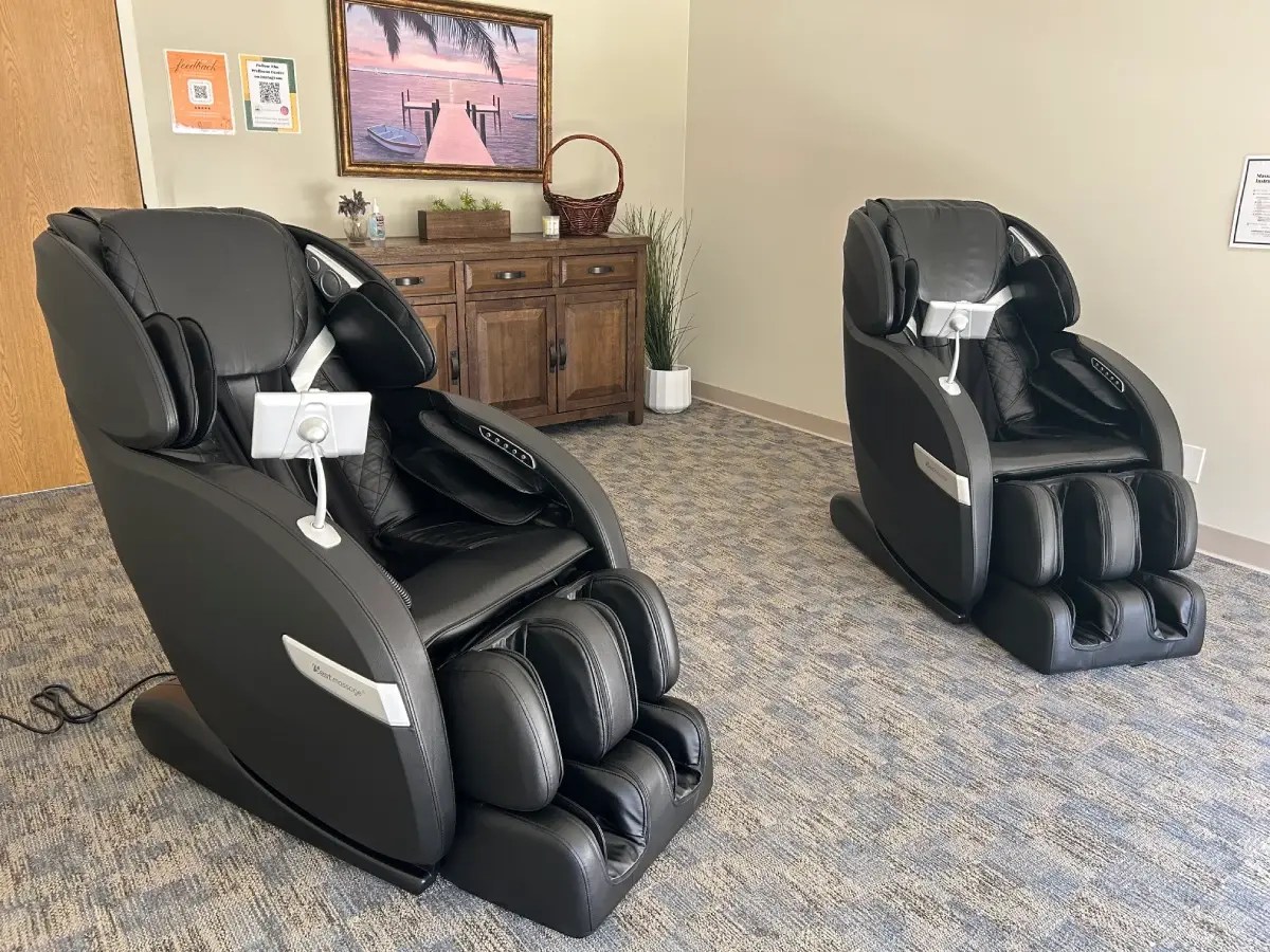 A massage chairs in a room