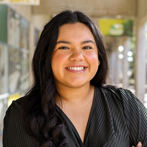 A woman smiling at camera