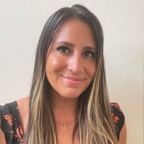 A woman smiling for a selfie