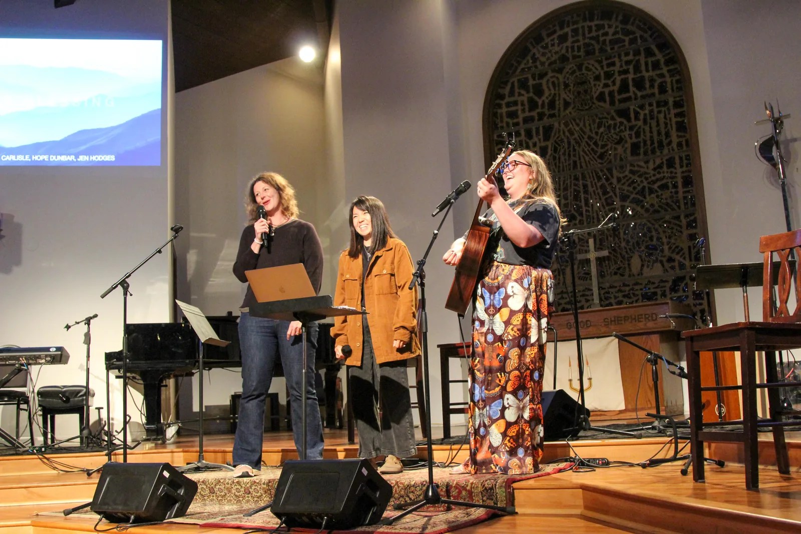Worship leaders singing on stage