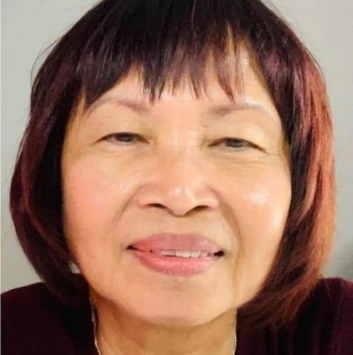 A woman smiling for the camera