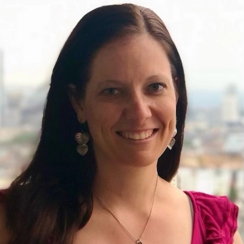 A woman smiling at the camera