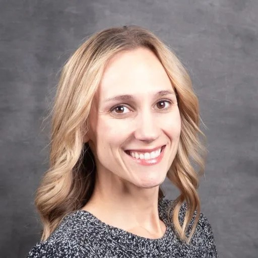 A woman smiling at camera