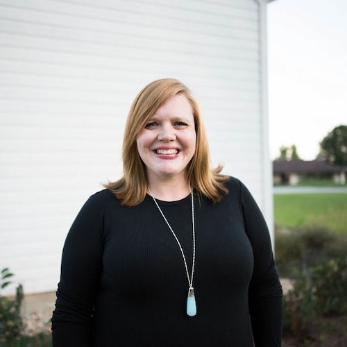A woman smiling at camera