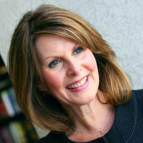 A woman smiling at the camera