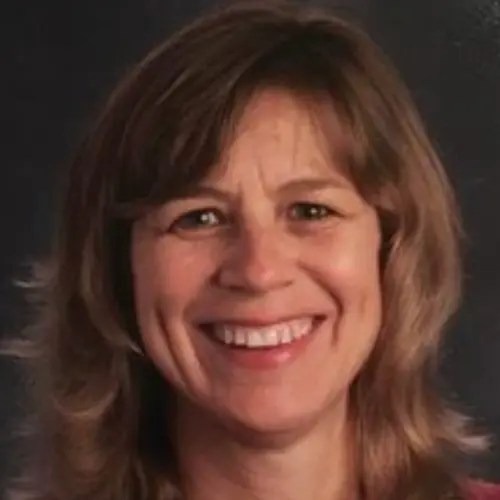 A woman smiling for a picture