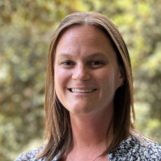 A woman smiling at the camera
